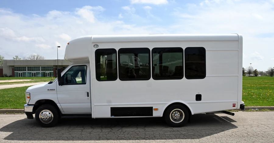 14-Passenger White Bus exterior